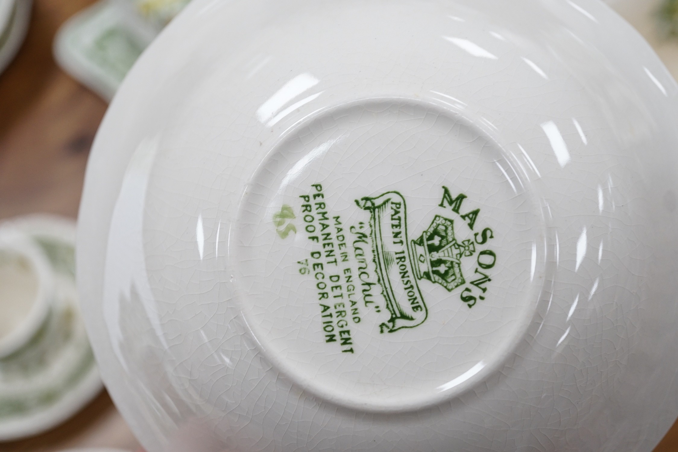 A complete Masons Ironstone Manchu pattern dinner service (settings for twelve persons), comprising twelve dinner plates, twenty-two dessert plates, twelve side plates, twelve soup dishes, twelve bowls, carrying plate, e